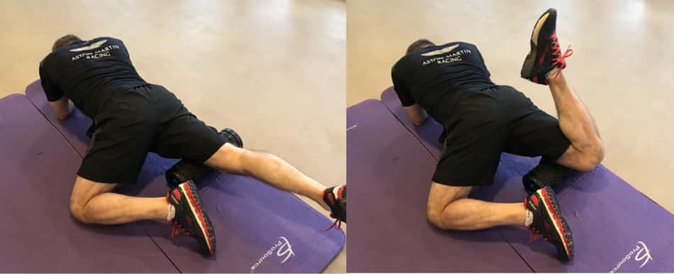 foam rolling on the mat with a bended knee